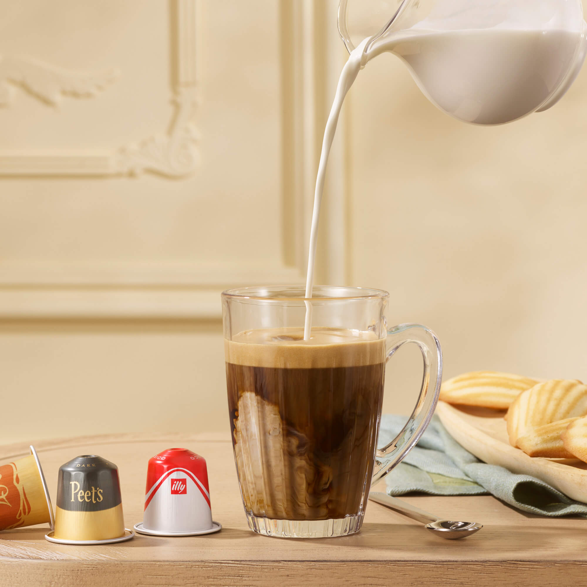 Image of cream being poured into coffee