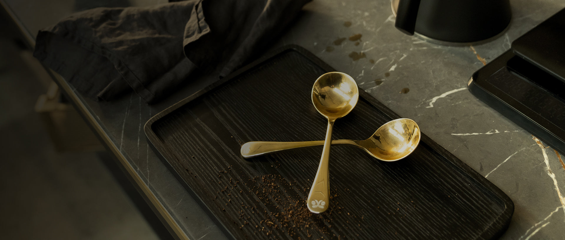 Spoons resting on cafe counter