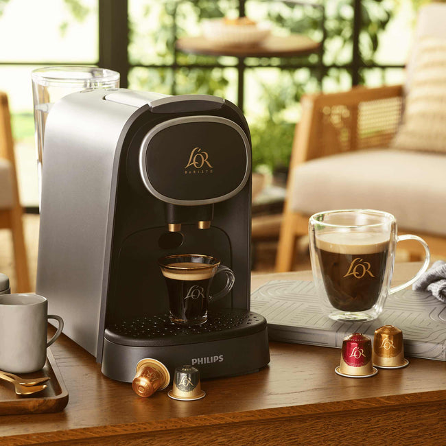 Image of L'OR Barista with cups and capsules