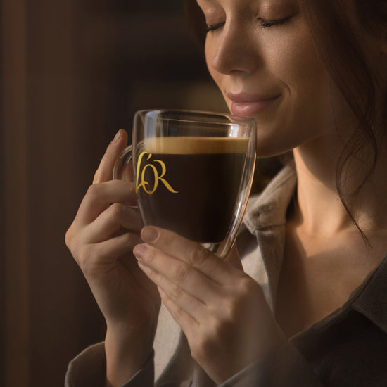 Image of L'OR Glass Coffee Mug being used.
